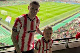 James McClean pictured with his son Junior at the Aviva Stadium supporting Derry City in the FAI Cup Final.