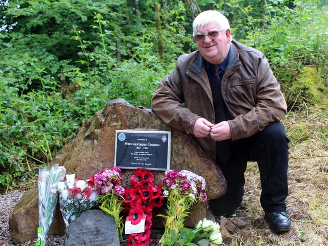 Liam Canning at a memorial stone to his late aunt Gertrude in Inveraray