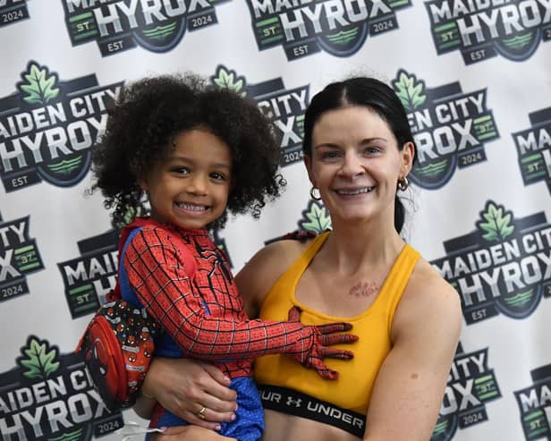 Suzanne McGilloway, pictured with her son, completed the Mixed Doubles at the Maiden City Hyrox IV held at Sean Dolans GAC, in a time of 1.01.43.  Photograph: George Sweeney
