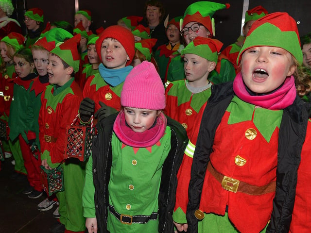 Children from Culmore Kids Club sing Christmas carols at the Culmore Community Hub on Friday night. Photo: George Sweeney