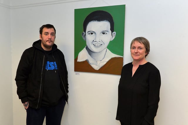 Artist Square Bear pictured with Judie Logue at the launch of his exhibition ‘Injustice’ at the Eden Arts Centre on Monday evening last. The exhibition commemorating the 51st anniversary of Bloody Sunday runs until 1st February next.  Photo: George Sweeney. DER2305GS – 74