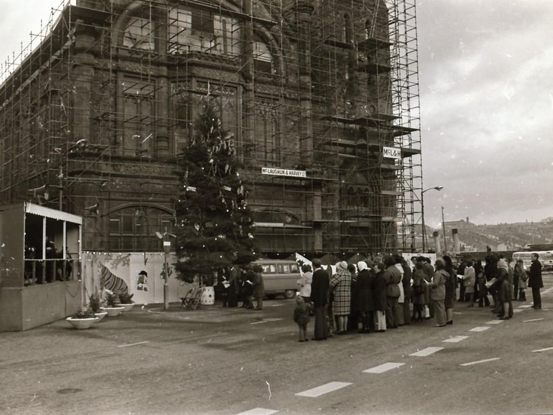 Interdenominational Christmas carols for peace outside the Guildhall in December 1974.