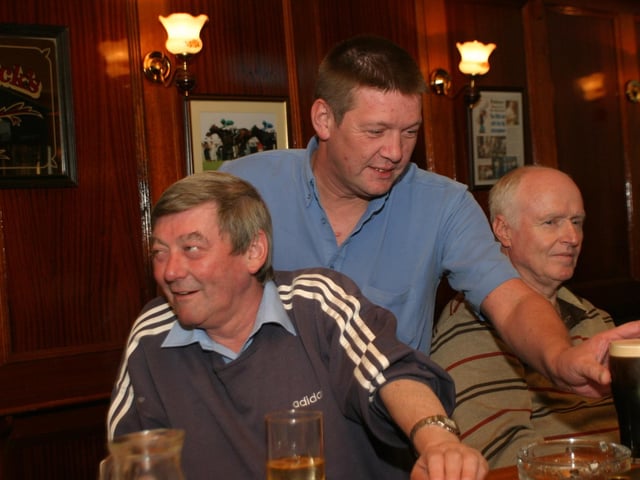 Regulars enjoying the company and the crack in the Alleyman's in July 2004.