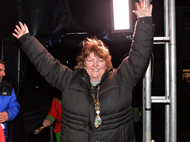 The Deputy Mayor of Derry and Strabane, Alderman Niree McMorris enjoys the Christmas carol singing at the Culmore Community Hub on Friday night. Photo: George Sweeney