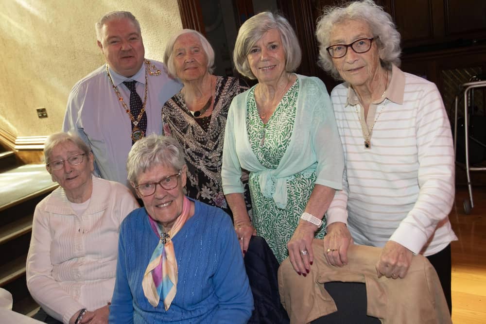 Deputy Mayor Darren Guy pictured with a group of ladies enjoying the Mayor's Tea Dance on Wednesday.