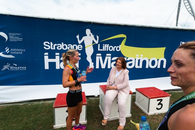 Mayor of Derry City and Strabane District Council, Councillor Patricia Logue chats to a competitor at the finishing line on Sunday. (Photo: Karol McGonigle)