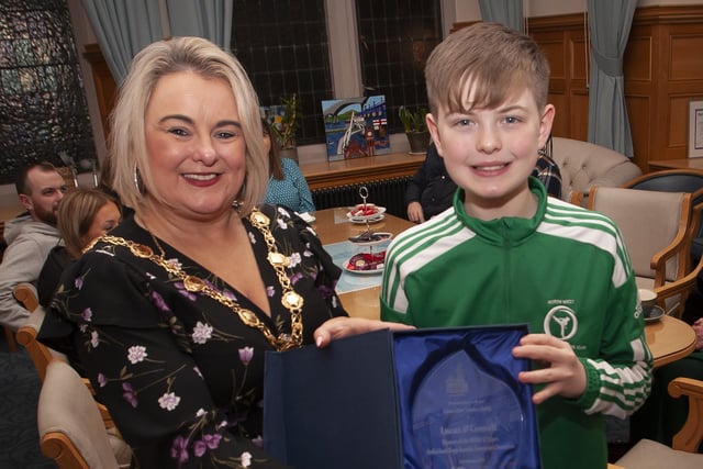 The Mayor of Derry City and Strabane District Council, Sandra Duffy making a special presentation to Strabane teenager Lucas O’Connell to mark his recent victory in the WUKF 12 Years Individual Boys Komite European Championship at a reception in his honour at the Guildhall on Tuesday evening last. (Photos: Jim McCafferty Photography)