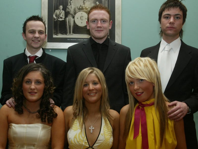 Ashley Watkins, Claire Elliott and Alannah Quinn with Gary Johnston, Gary Gallagher and Steven Haughey. Attendees at the formal in Strabane in April 2004