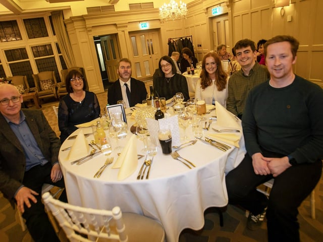 Retiring Chief Executive Officer of Derry Credit Union, Joan Gallagher pictured with members of her family at last week''s function in the Bishop's Gate Hotel, Derry.