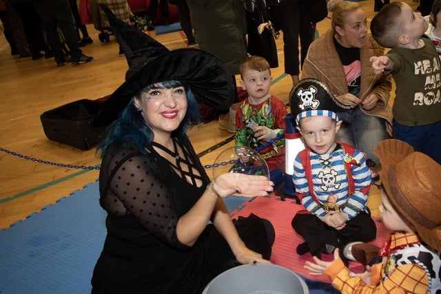 Children having fun with the Bubbles Lady at Monday's Halloween Fun Day.