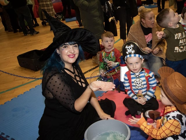 Children having fun with the Bubbles Lady at Monday's Halloween Fun Day.