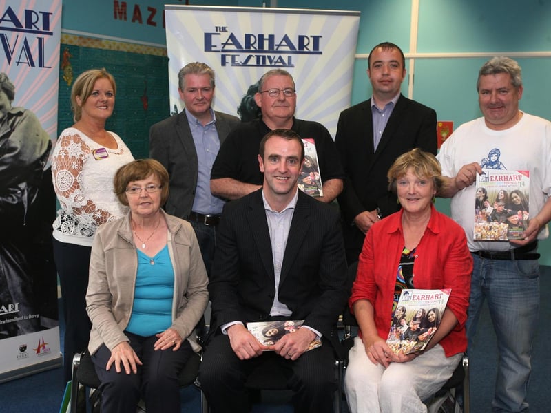 Minister for Environment, Mark H. Durkan pictured at the launch of the Earhart Festival, with front from left, Ethna McCullagh and Mary Casey, Friends of Amelia Earhart. At back from left, Stephanie McNicholl, Libraries NI, Joe Campbell, Councillor Tony Hassan, Councillor Brian Tierney and Ollie Green, Festival Director. DER2814MC088