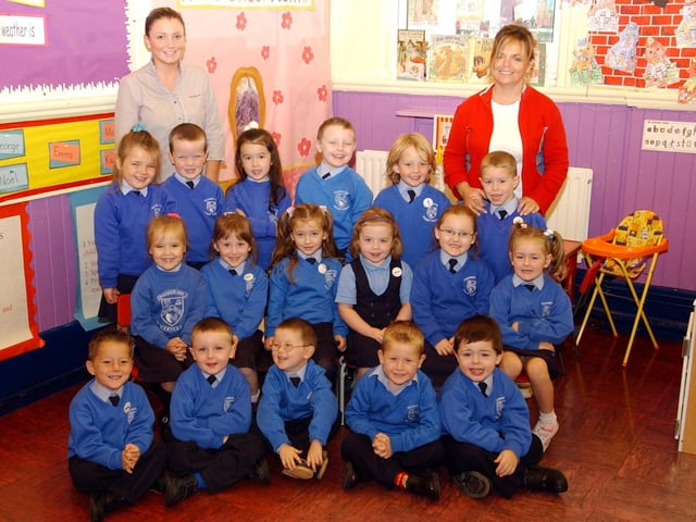 Primary 1 pupils from the nazareth House Primary School pictured with their teacher, Miss Sinead Doherty and classroom assistant, Mrs Lorna Dalzell. (2209A02):20 years on: Young people across Derry and Donegal starting school in September 2003
