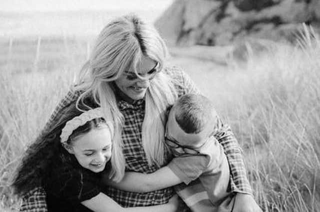 Bronagh Burke, with her children Adam and Aoife.