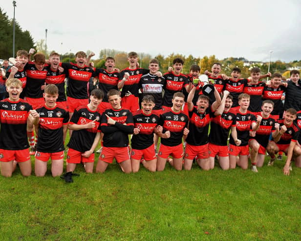 Kilrea players celebrate their victory over Doire Trasna, in the Carlin Duffy U17 final, at Claudy on Saturday afternoon. Photo: George Sweeney