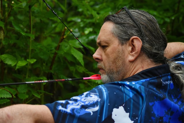 John Scott takes aim at one of the targets during Saturday's event.