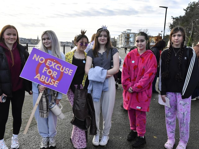 Proponents who participated in the Foyle Women’s Aid walk, from Sainsbury’s to the Guildhall on Sunday afternoon, supporting the United Nations Women’s Campaign to eliminate gender – based violence worldwide. Photo: George Sweeney