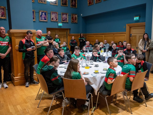 Doire Trasna GAC who are celebrating their 25th Anniversary received a commemorative crystal gift from the Mayor Councillor Ruairi McHugh in the Guildhall to mark their outstanding contribution to sport, community life and promotion of Gaelic games. During the evening the club’s traditional band and Irish dancers entertained guest with performances. Picture Martin McKeown. 22.01.26