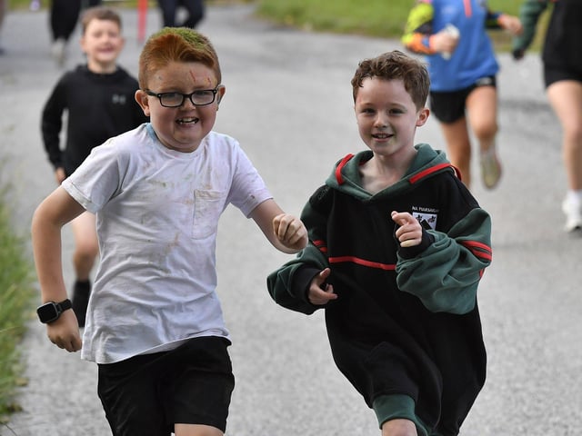 Participants in the Na Piarsaigh Dermot McCrossan Canter the Corrody 5km, held at Corrody Road on Sunday evening last. Photo: George Sweeney