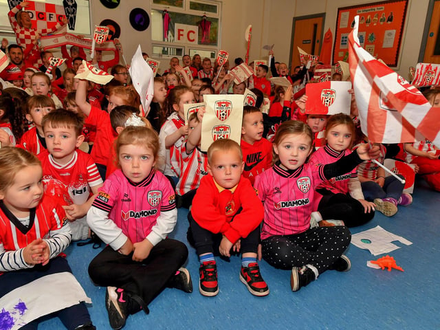 Pupils from Gaelscoil Eadain Mhoir pictured during the visit from Derry City players Ciaran Coll and Pat Hoban. Photo: George Sweeney