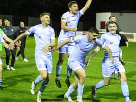 Derry CIty's Ronan Boyce, Joe Thomson, Cian Kavanagh and Ryan Graydon celebrate in front of the travelling fans.