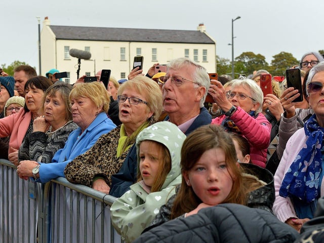 Some of the large attendance at Ebrington Square sing along during Phil Coulter’s  live performance of his iconic hit ‘The Town I Loved So Well' on Saturday afternoon last. Photo: George Sweeney.  DER2240GS – 24