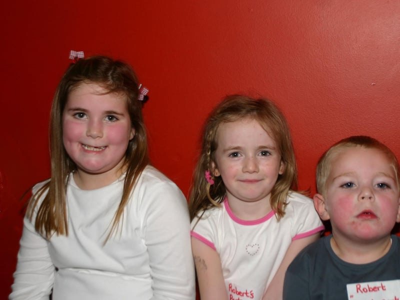 Birthday Boy Robert McLaughlin with sister Eddi and Aiofe at the party in Bannans 632 /dd : .