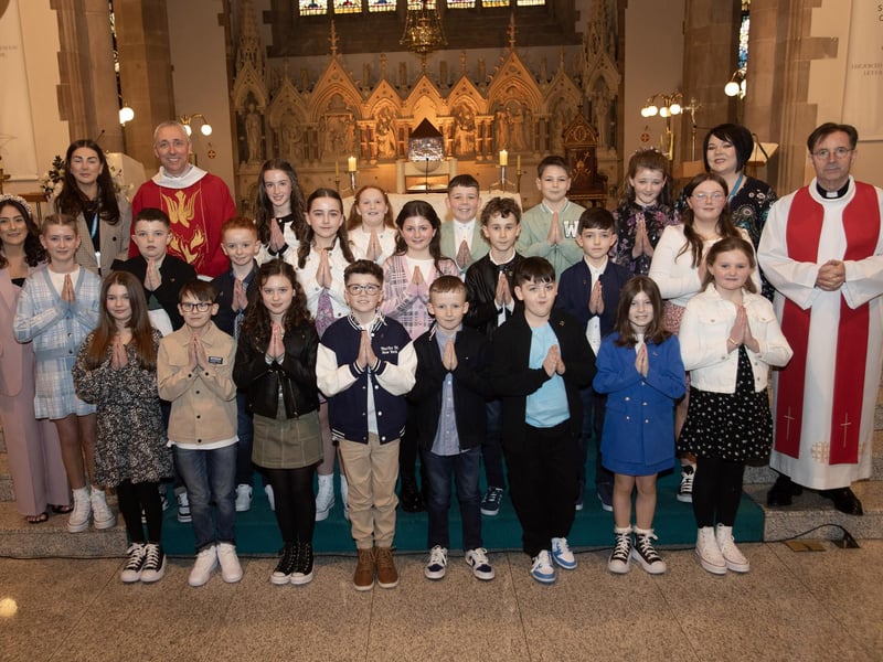 Pupils from Rosemount PS who received the Sacrament of Confirmation from Fr. Paul Farren at St. Eugene's Cathedral on Friday last. Included are Mrs Meenan, teacher, Ms Rowe, classroom assistant, Mrs McGuinness, classroom assistant and Fr. Shaun Doherty. (Photo: Jim McCafferty Photography)