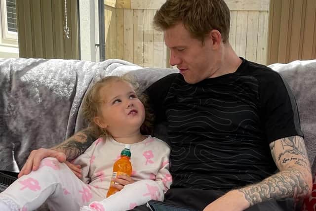 James McClean and his daughter Willow enjoy some down time.