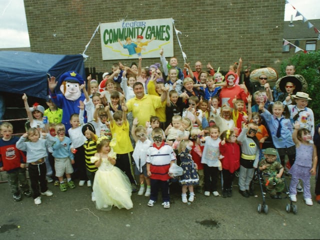 Children with some colourful characters enjoying the Leafair community games.