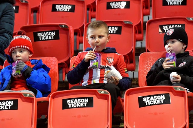 Young fans have some refreshments at Derry City’s game against Cork City on Friday evening. Photo: George Sweeney. DER2308GS – 140