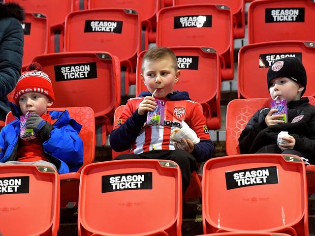 Young fans have some refreshments at Derry City’s game against Cork City on Friday evening. Photo: George Sweeney. DER2308GS – 140