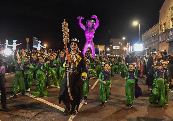 Mayor Ruairí McHugh leads the ‘City of the Bones’ Halloween carnival parade on Friday evening. Photo: George Sweeney