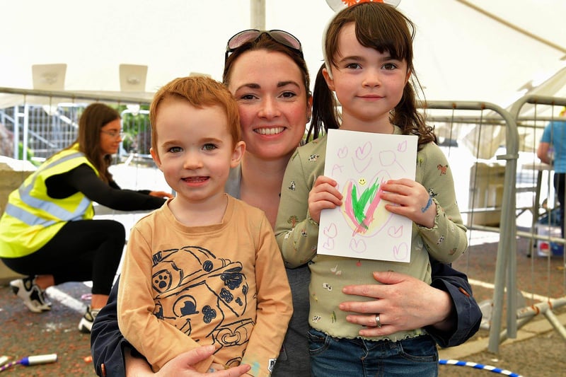 Finn and Ava O’Neill with their mum Shauna at the Carndonagh Family fun Day on Saturday afternoon last. Photo: George Sweeney. DER2327GS - 094