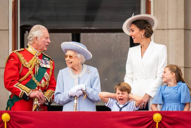 Then Prince of Wales (now King Charles III), Queen Elizabeth II, Prince Louis, the then Duchess of Cambridge (now the Princess of Wales)and Princess Charlotte on the balcony of Buckingham Palace after the Trooping the Colour ceremony at Horse Guards Parade, central London.