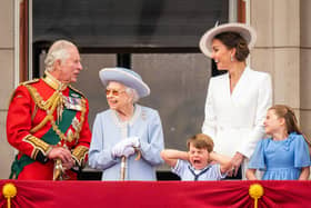 Then Prince of Wales (now King Charles III), Queen Elizabeth II, Prince Louis, the then Duchess of Cambridge (now the Princess of Wales)and Princess Charlotte on the balcony of Buckingham Palace after the Trooping the Colour ceremony at Horse Guards Parade, central London.
