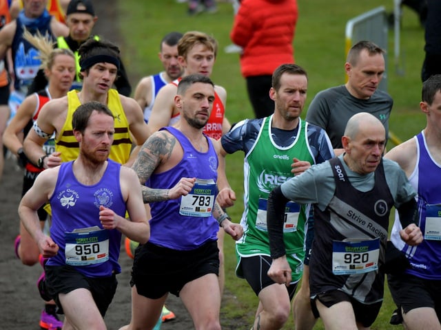 Foyle Valley’s Pius McIntyre (950) and Sean O’Donnell (783) competing in the Bentley Group Derry 10 Miler road race on Saturday morning. Photo: George Sweeney. DER2310GS – 091