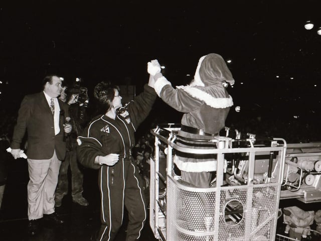 Santa, with help from TV Gladiator Falcon, also known as Bernadette Hunt, switched on the Derry Christmas lights.