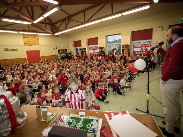 Mr. Feargal Friel addressing the pupils and staff before the arrival of Derry City's Mark Connolly and Nick Twist on Friday. (Photos: Jim McCafferty Photography)