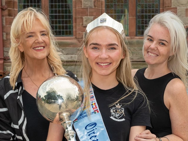Derry City and Strabane District Council Mayor, Councillor Ruairí McHugh welcomed members of the McConomy-Bradley-Doherty Academy to the Guildhall as they celebrate their outstanding success at the recent World Championships in Dublin. Four times World Champion Caitlin Murray pictured with her teachers, Rosetta McConomy and Elan McConomy-Bradley. Picture Martin McKeown. 19.06.25