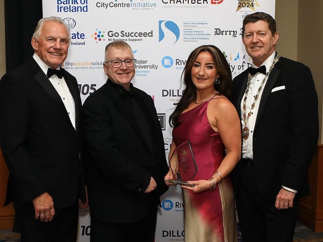 Ian Crowe, Secretary of CCI and Greg McCann, President of Londonderry Chamber of Commerce, pictured with Millennium Forum team, winners of Creative Marketer of The Year Award.