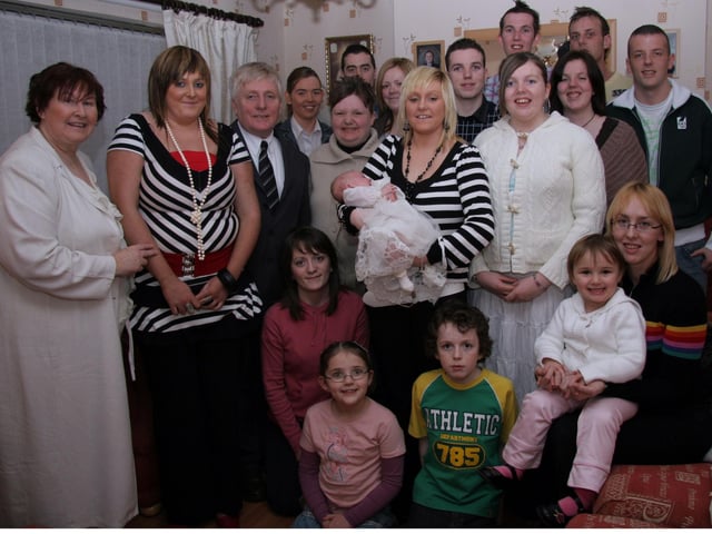 Friends and family gather to celebrate the Christening of baby Megan Ann Ellen Smith 0051JML : Parties and celebrations March 2006: Megan Ann Eileen Smith.