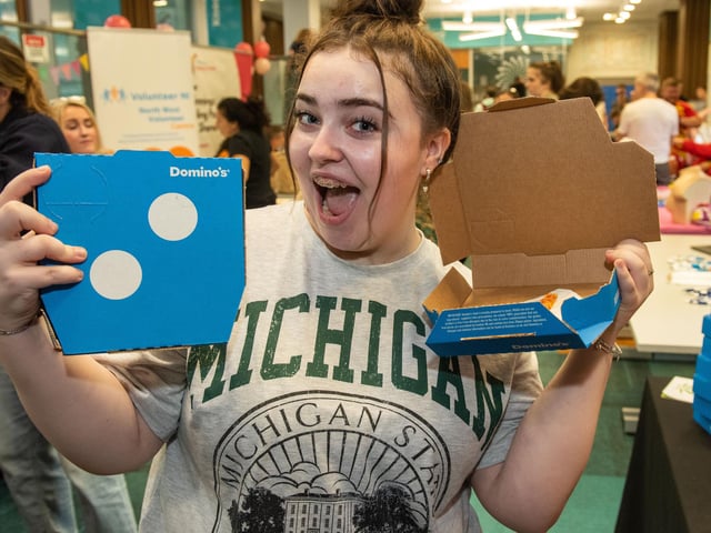Amy Corey tries out the Dominoes pizza at Freshers' fest at NWRC's Strand Road campus. 