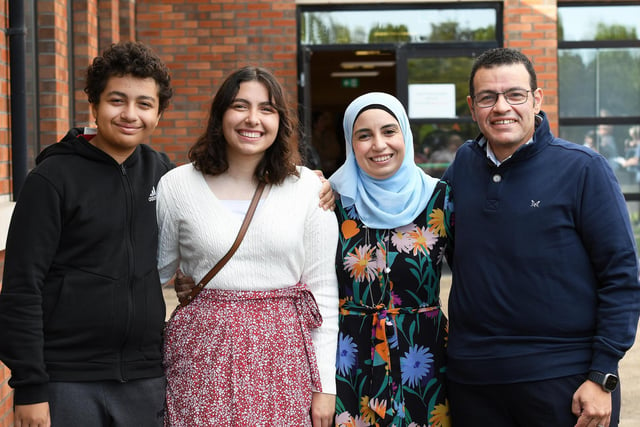 Jana Marzouk pictured with her proud family members after collecting her GCSE results at Thornhill College.