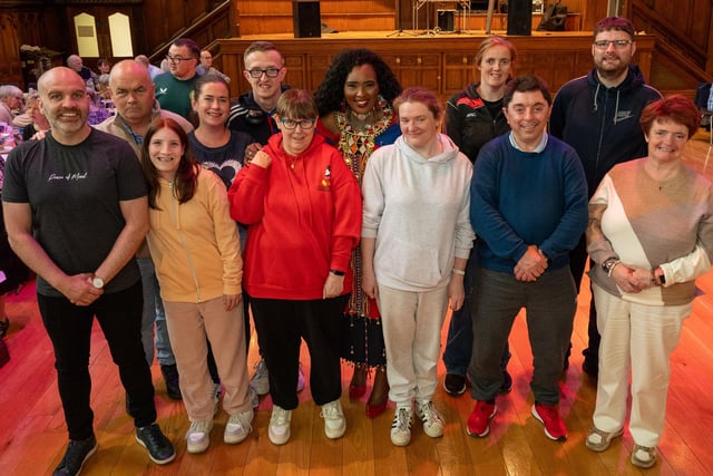 The Mayor Councillor Lilian Seenoi-Barr pictured with staff and members of Destined as she hosted an Afrobeat Tea dance in the Guildhall which blended traditional waltzes with a selection of upbeat tunes bringing people to their feet on the dance floor of the main hall. Picture Martin McKeown. 09.10.24