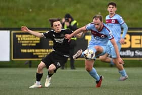 Institutes Conor Quigley  in action with Ballymena’s  Fraser TaylorMandatory Credit INPHO/Presseye/Stephen Hamilton