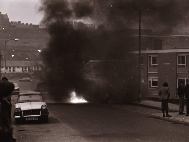 The aftermath of rioting in Derry during which the Post Office sorting office was burnt down.