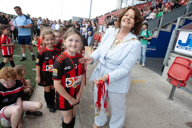 Mayor of Derry City & Strabane, Colr Patricia Logue, hands out medla at the Ryan McBride Brandywell Stadium.