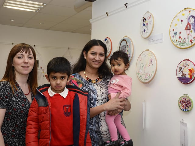 Pictured at the opening of the exhibition of work by students from the Women's Centre Multi Cultural and Young Women's Group in the Eden Place Arts Centre as part of International Women's Day were, from left, Roisin O'Donnell, art facilitator, Dhruva, Ashwini and Khushi Shivashankar. DER1215-107KM