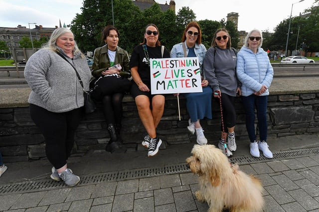 People gather for a Vigil for Gaza held on the Peace Bridge on Friday Evening, organised by the Derry Irish Palestinian Solidarity Campaign. Photo: George Sweeney
